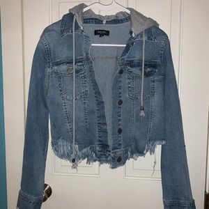 Distressed denim jacket